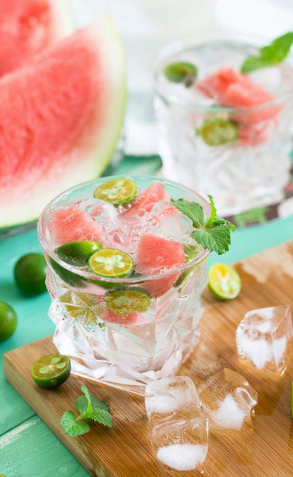sliced watermelon with lemon on shot glass